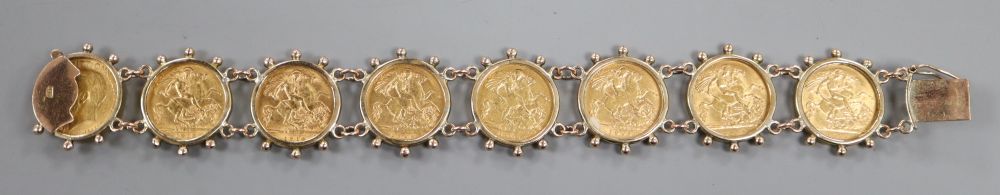 A 9ct mounted gold half sovereign bracelet, set with eight half sovereigns, gross weight 53.5 grams,